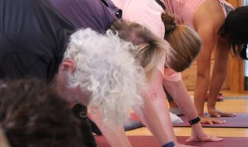 Group Pilates class practicing on mats for flexibility and strength. Group Pilates class practicing on mats for flexibility and strength.