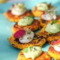 Vegan Vegetable Fritters with Avocado Topping Delicious vegan vegetable fritters topped with creamy avocado and fresh herbs, perfect for a healthy.