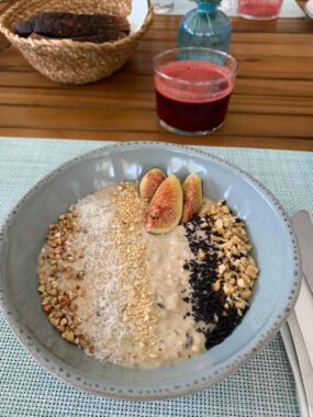 Healthy breakfast bowl with figs, nuts, and seeds for wellness.