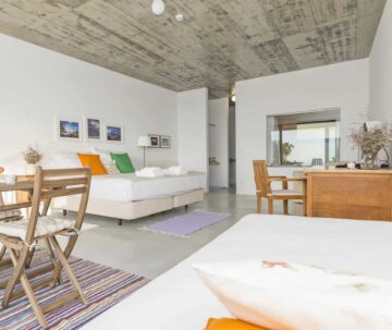 Modern Pilates studio with bright, airy interior and wooden furniture. Bright, airy Pilates studio with minimalist decor and natural light.